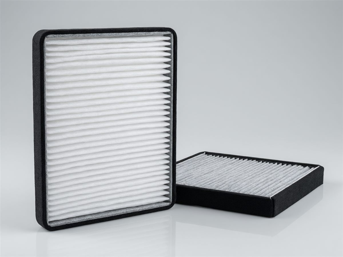 Activated carbon cabin air filter with pleated media and black frame (illustrative)